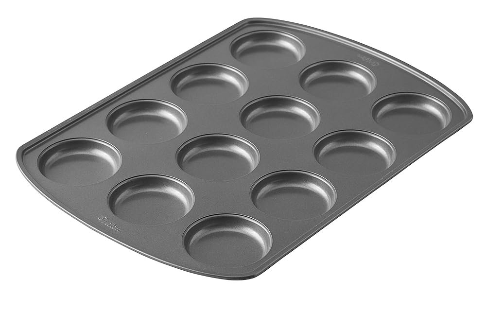 Wilton Perfect Results 12-Cavity Muffin Top Pan, Made without PFAS Non-Stick Bakeware, Scratch Resistant Baking Pan (Steel), the Must-Have Kitchen Essential.